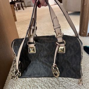 Michael Kors purse signature logo